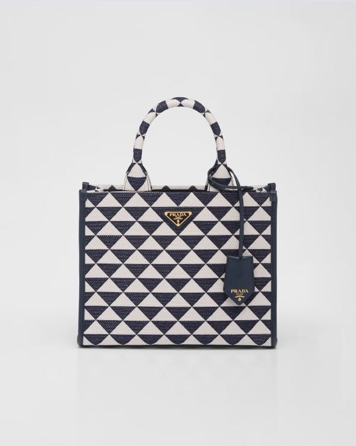 Small PDA Symbole embroidered fabric handbag