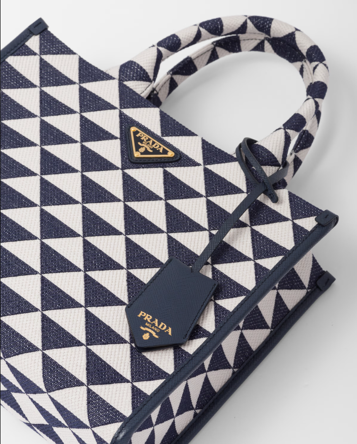 Small PDA Symbole embroidered fabric handbag