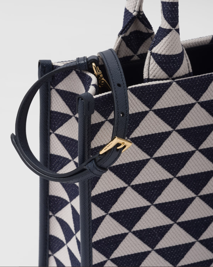 Small PDA Symbole embroidered fabric handbag