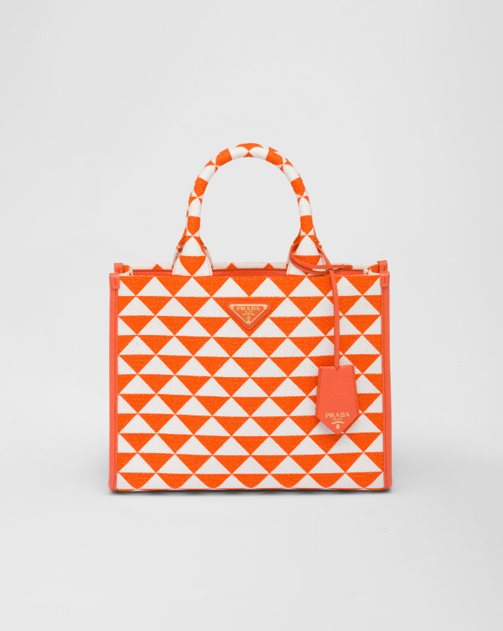 Small PDA Symbole embroidered fabric handbag