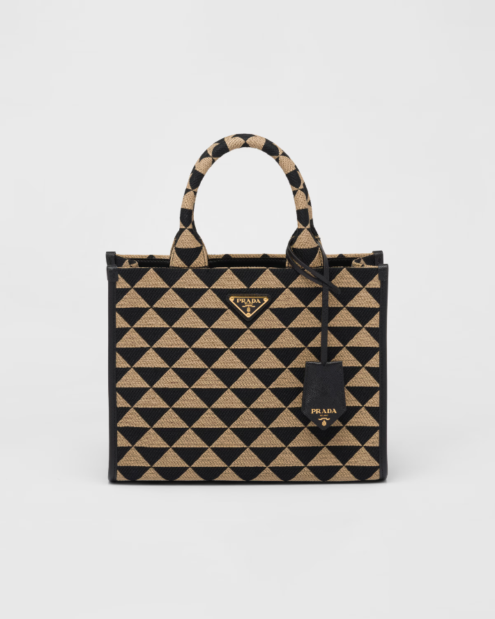 Small PDA Symbole embroidered fabric handbag